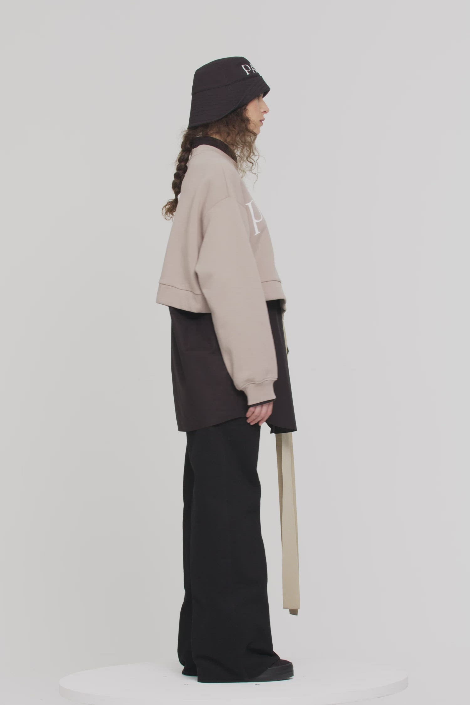 Patou - Cropped grosgrain sweatshirt in organic cotton - Parchment - Comfort with a side of couture: the sweatshirt by Patou.Parchment beige organic cotton sweatshirt. Loose cropped silhouette. Crewneck. Rib knit collar and cuffs. Oversized Patou lettering logo in white across the front. Drawstring waistband with long grosgrain ties.