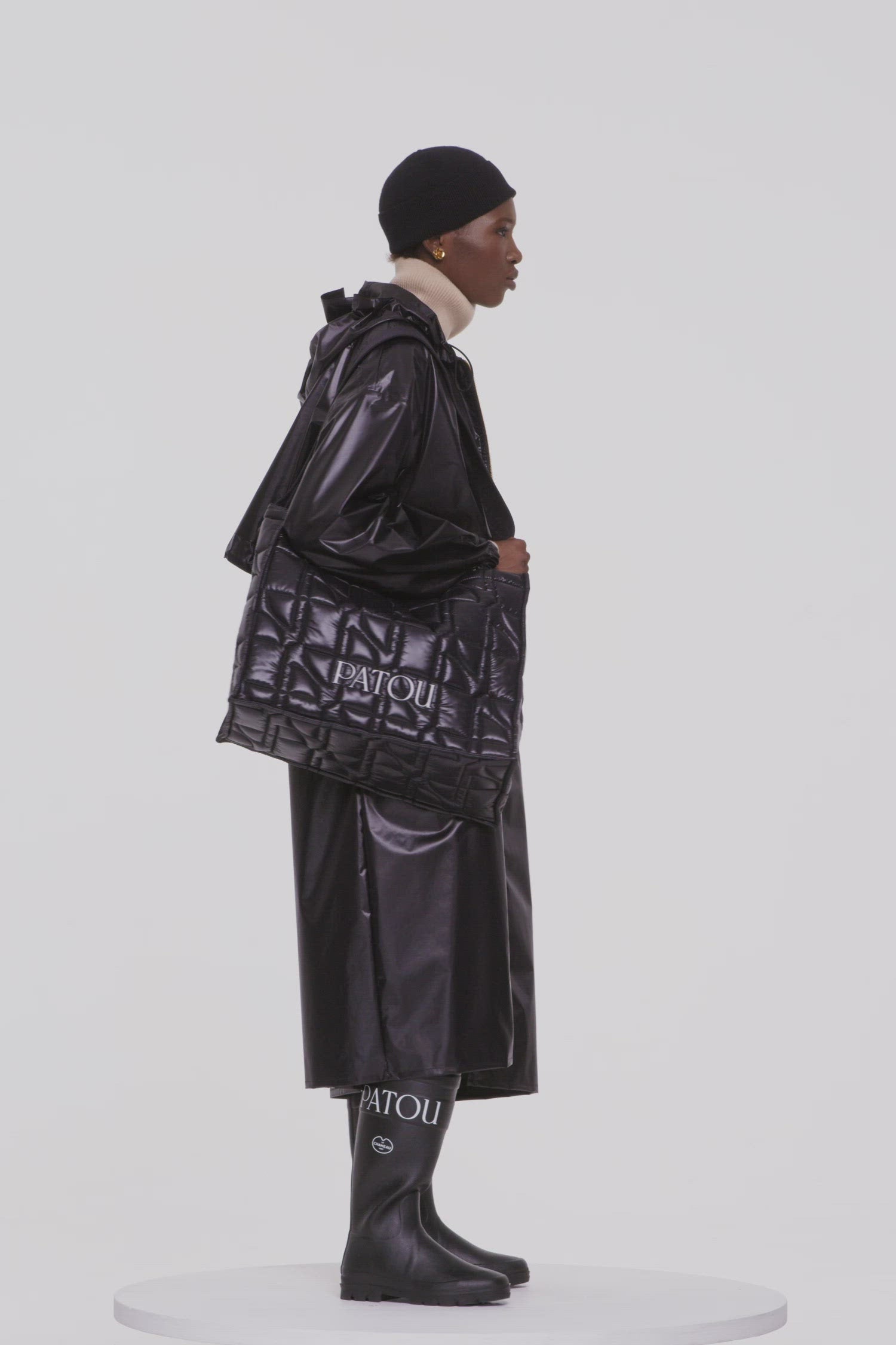 Patou - Signature raincoat in water-repellent polyester - Black - Singing in the rain, dreaming in Patou.Black polyester blend raincoat. Lightweight water-repellent design. Hooded collar with drawstring. Two-way gold-tone zip with black JP pullers inspired by a heritage keyring from the Jean Patou archive. Storm flap with adjustable drawstring. Elasticated cuffs. Loose fit (select one size down for a fitted look).