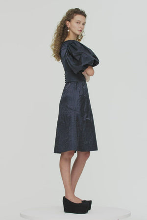 Cocktail dress in metal satin