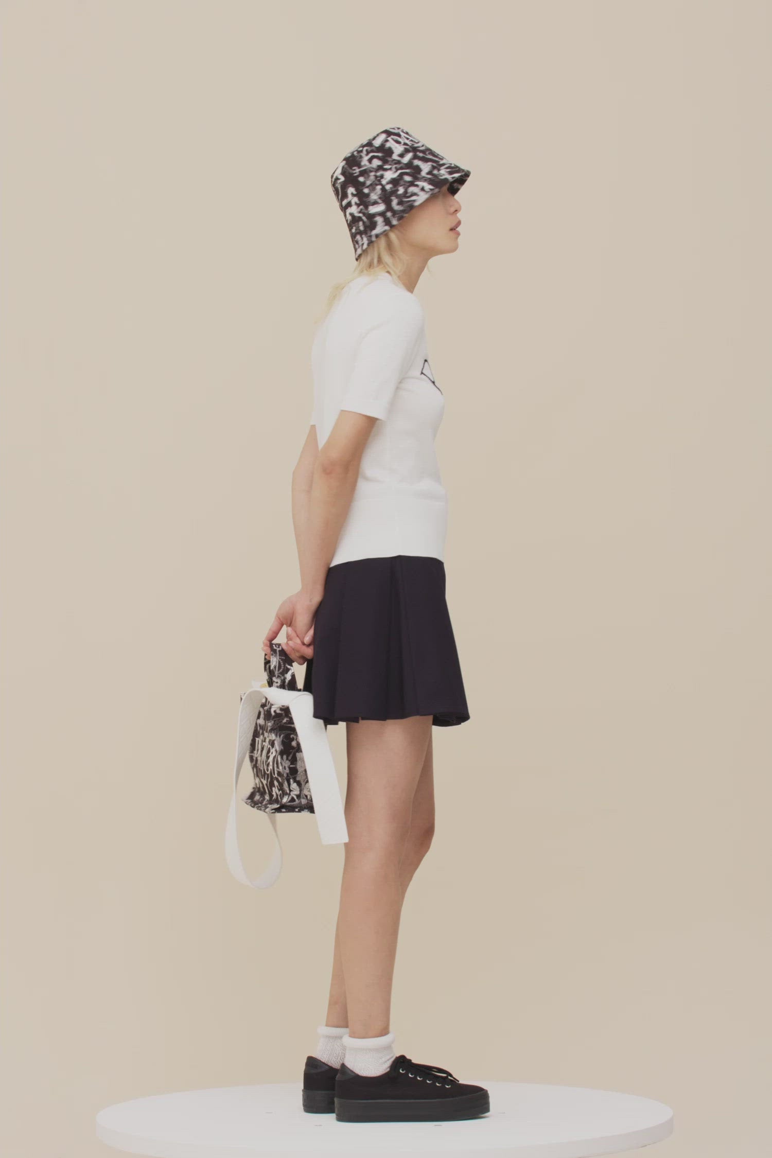 Patou | Belted pleated mini skirt in organic cotton